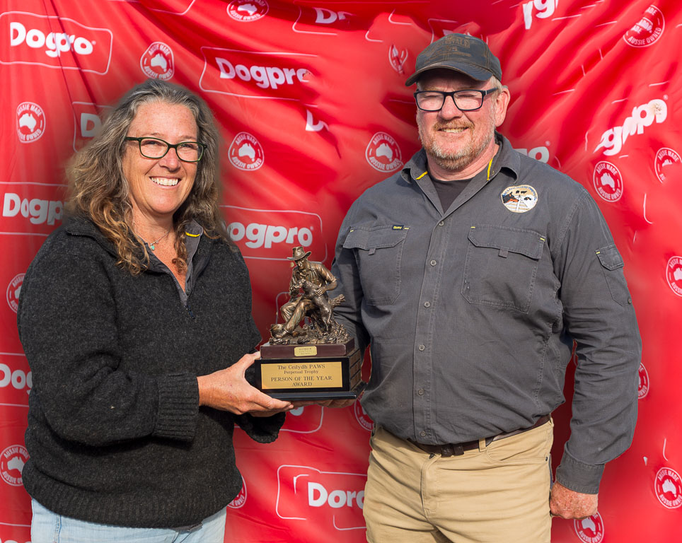 Anna Edwards being presented with the Ceilydh PAWS Person of the Year award in recognition for service to the club, presented by President Simon Leaning.